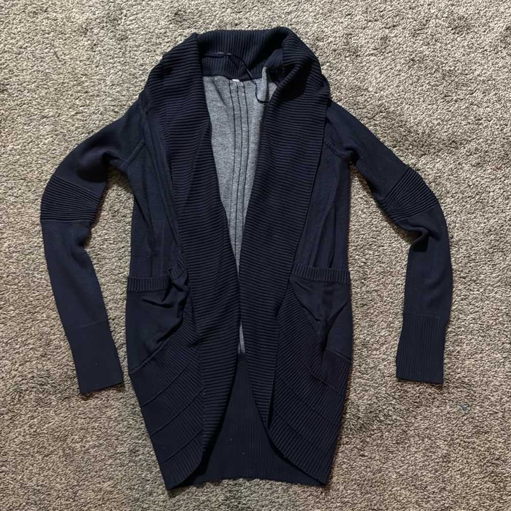 Lululemon navy cardigan with side pockets. Approx size 6 or 8